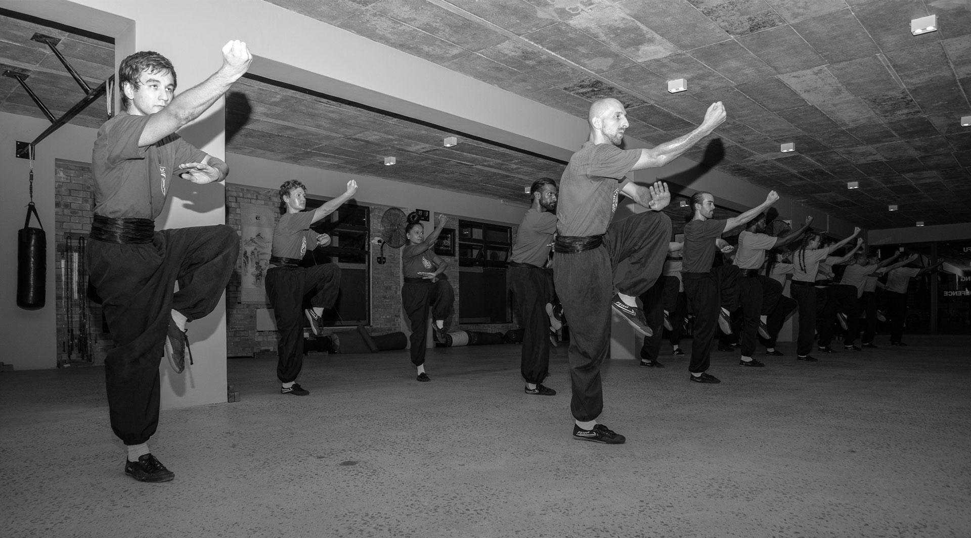 Adult Kung Fu students training together